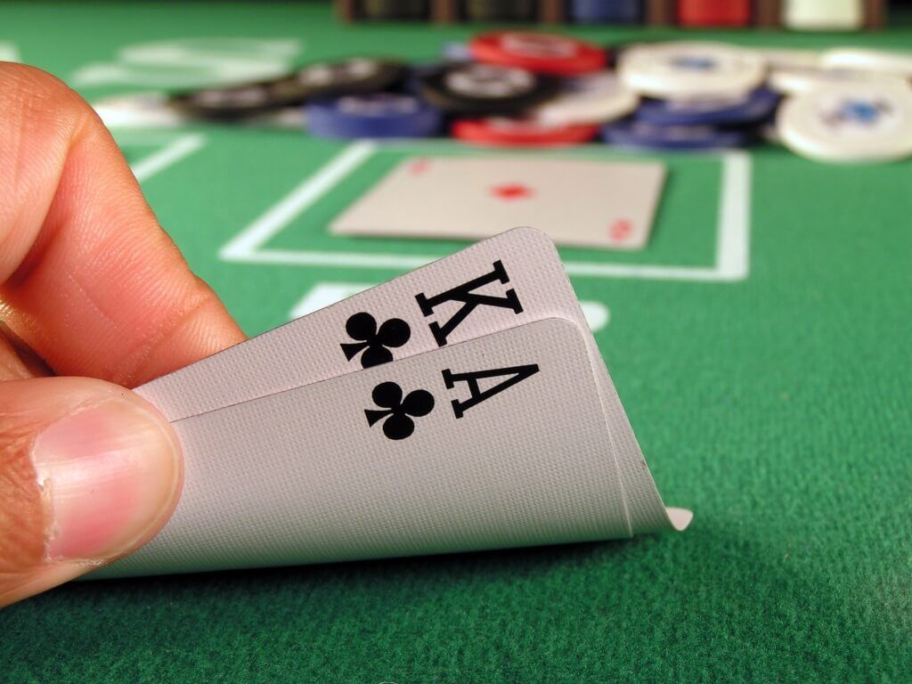 big slick, ace and king of clubs as a hold’em poker starting hand